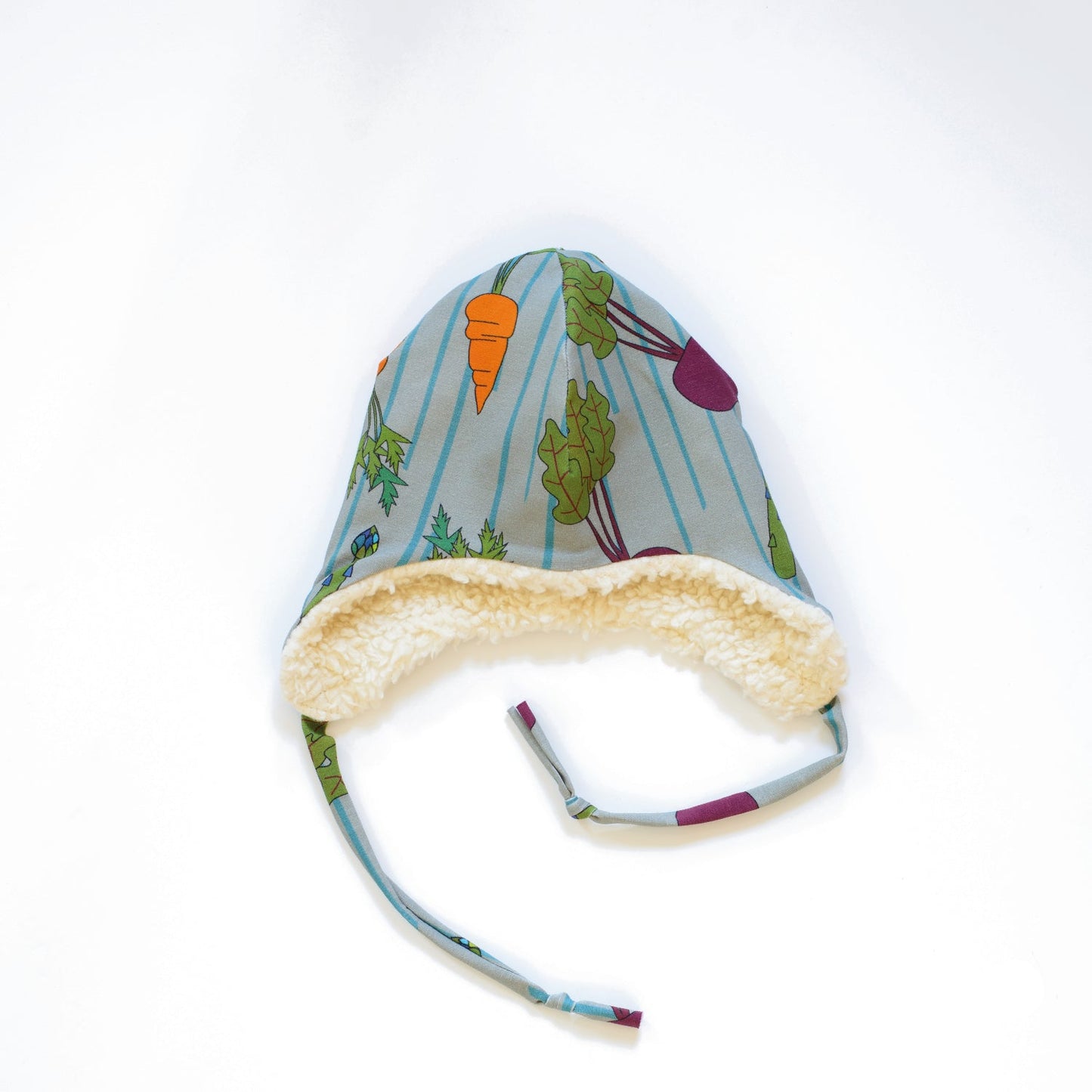 ILO's Eat Your Veg bestseller aviator winter hat, lined with organic, unbleached cotton plush, with ear flaps and ties.