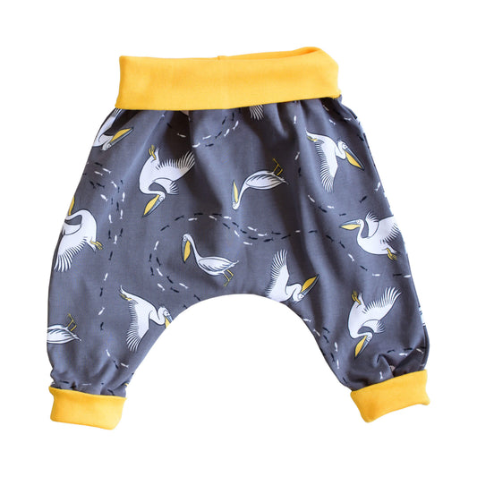 size adjustable harem trousers perfect crawlers in a pelican print with contrasting yellow waistband and cuffs. Made in Bristol, UK