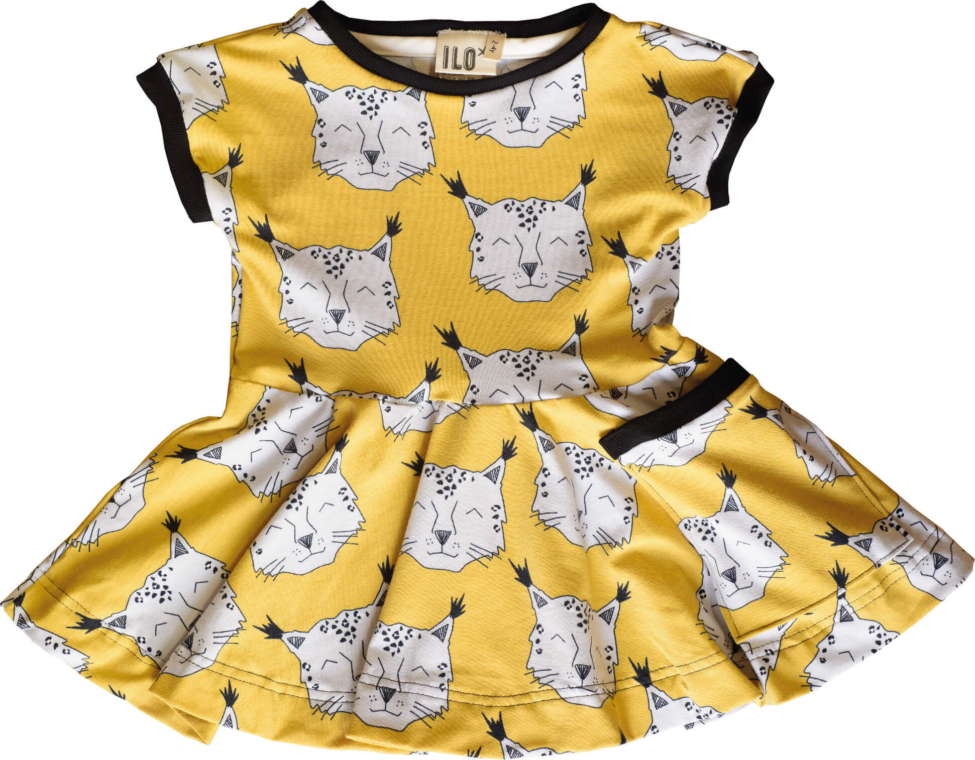dress for baby and children in yellow with snow leopard faces in white with black ribbing. Skater style means it has a flowy skirt and also 1 pocket.