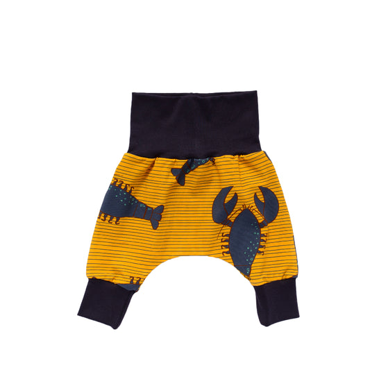 organic cotton jersey crawler baby and toddler trousers in a blue lobster print with stripes on gold background and contrasting navy blue waistband and cuffs, made in Bristol, UK
