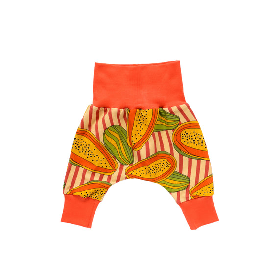 harem crawler trousers for baby and child with no elastic, foldable cuffs and waistband in a contrasting orange and papaya print. made in Bristol, UK