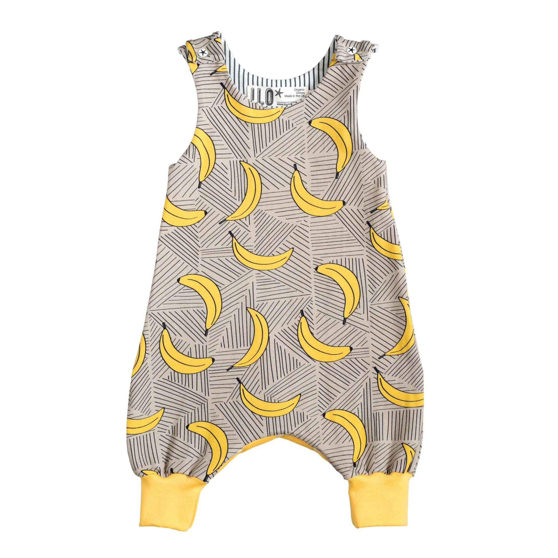 baby romper with bananas on a beige background colour fabric of organic cotton jersey